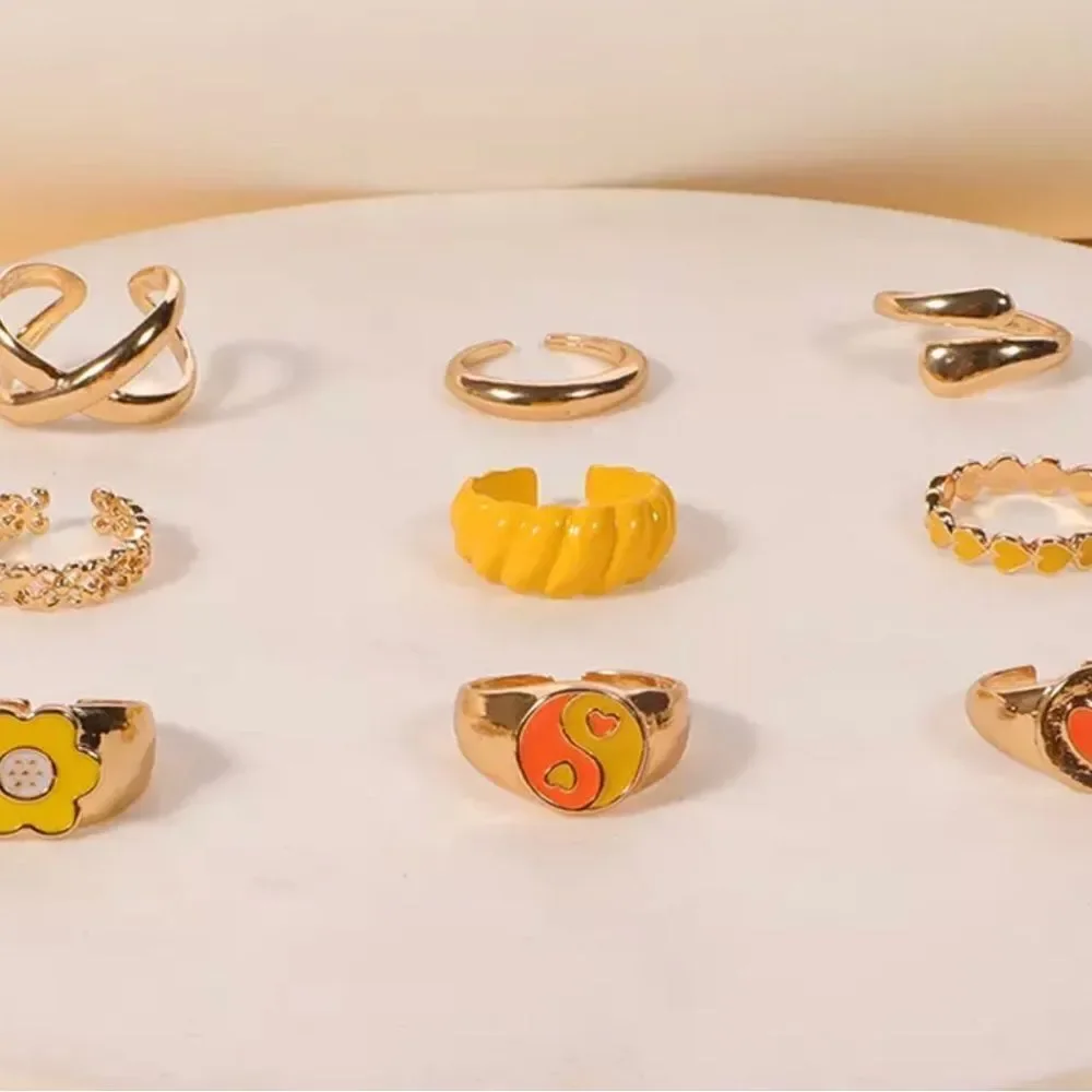 SET OF 9 RESIZABLE RINGS IN‎ YELLOWS AND ORANGE